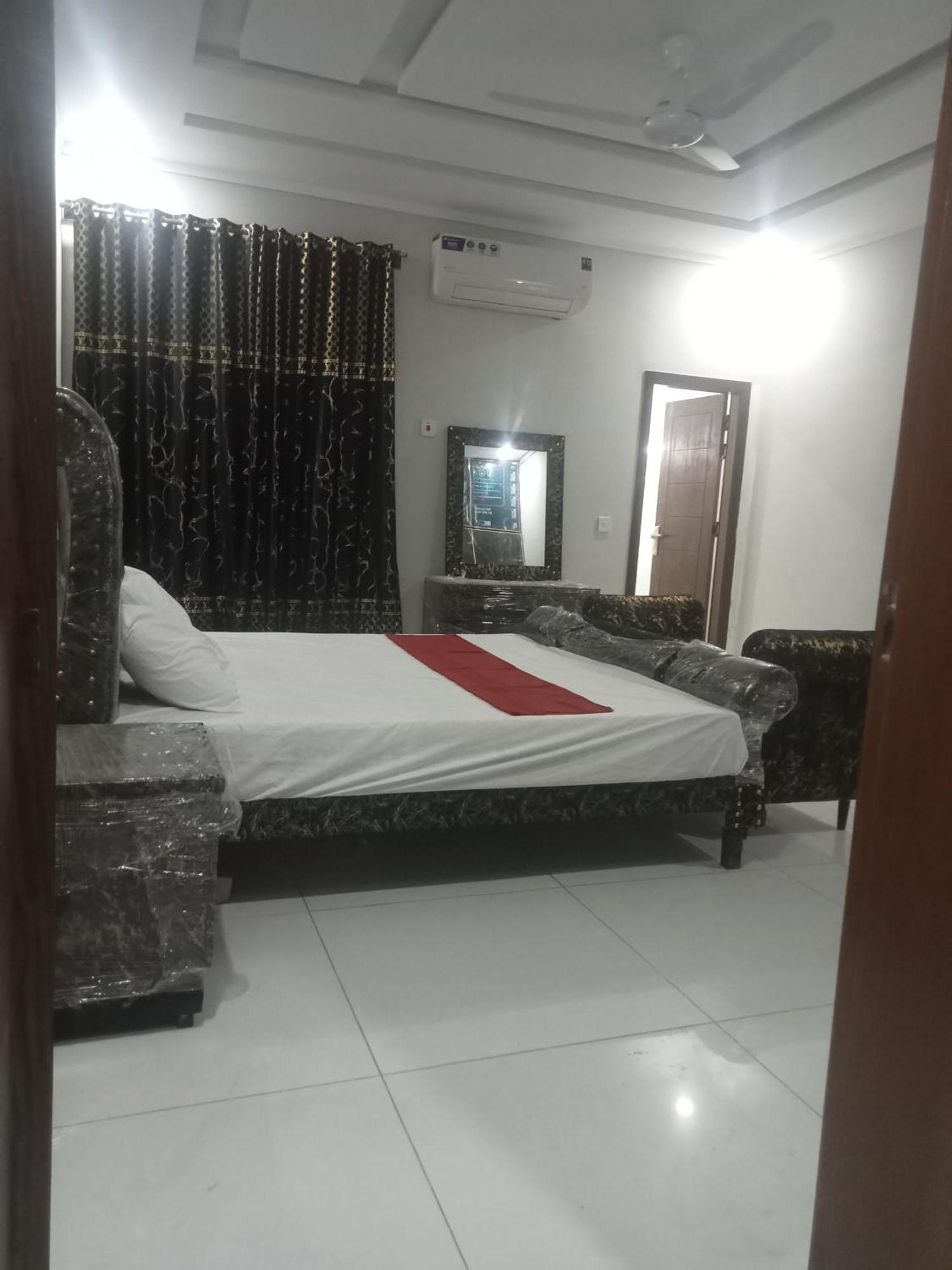 Ryazm Guest House Rawalpindi Esterno foto